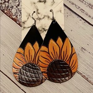 Leather earring. Approx. 3in